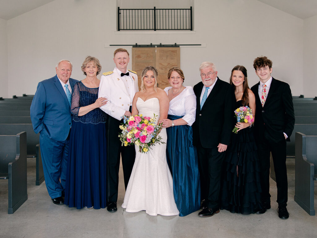 family photos of both sides of bride and grooms family's for their wedding at Davis & Grey Farms