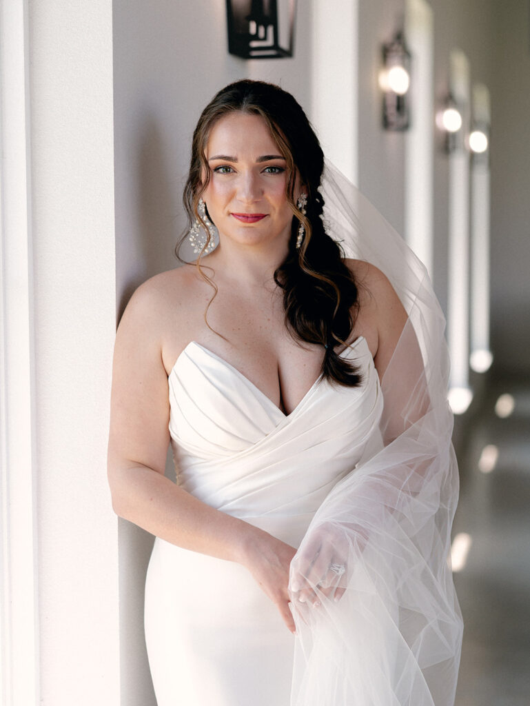 Bride looking at the camera with a soft smile