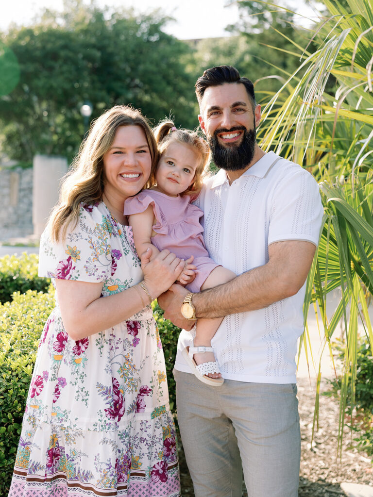 mom dad and young daughter family photo session in north dallas