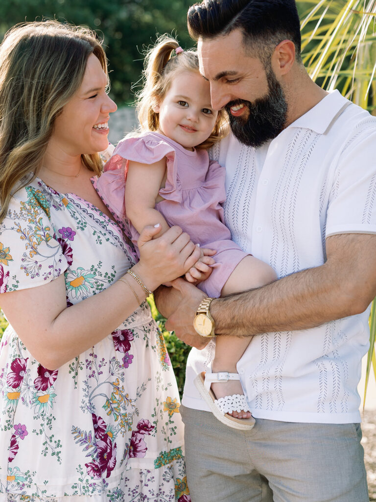 mom dad and young daughter family photo session in north dallas