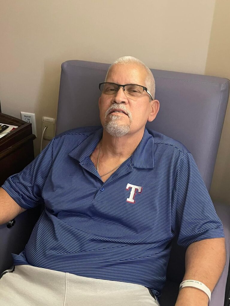 man in hospital chair